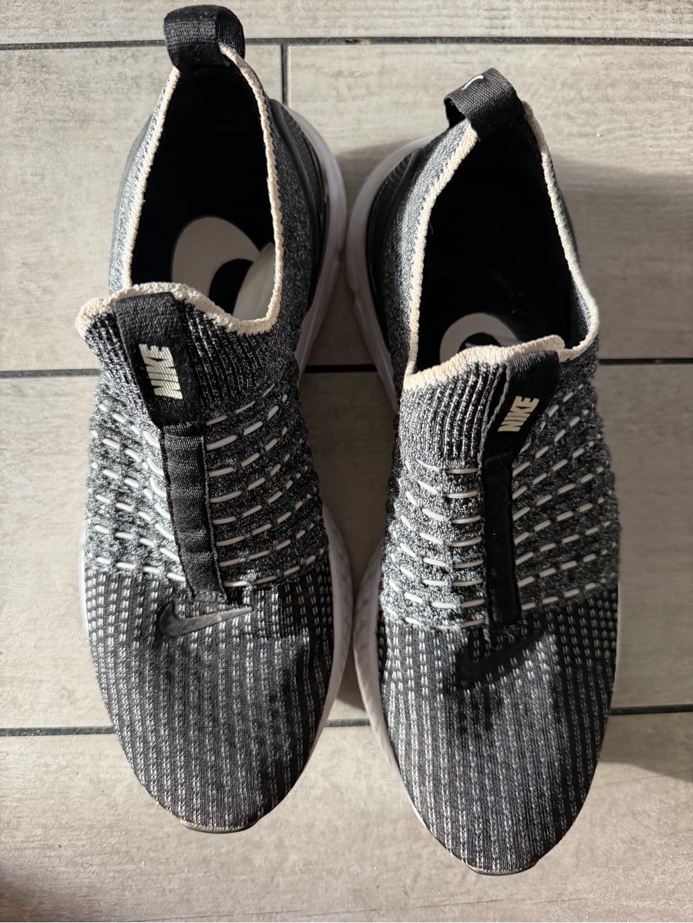 Nike Black and White Knit Slip-On Sneakers